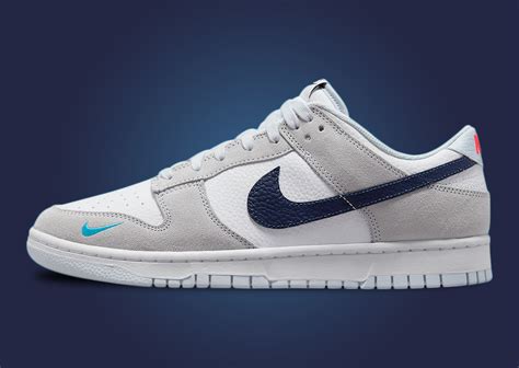 Nike dunks with blue swoosh